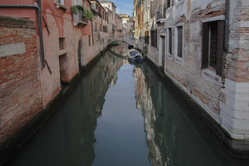 Venice, Italy, June, 21, 2016: landscape with the image of boats on a channel in Venice, Italy