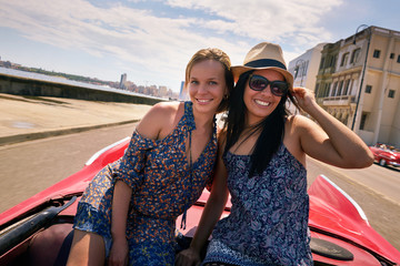 Happy Couple Tourist Girls On Vintage Car Havana Cuba