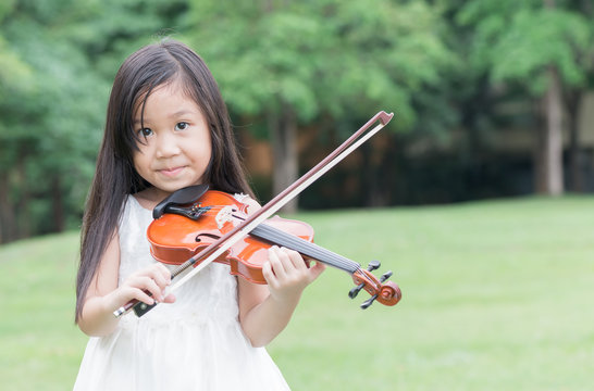 Cute Asian Girl Play Violin