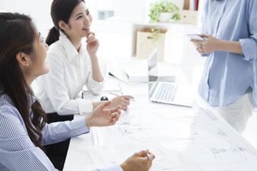 Fototapeta premium Businessman who has been a meeting while looking at the blueprint