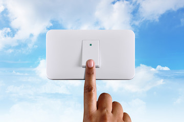 Hand Push Electronic Switch with Sky Background