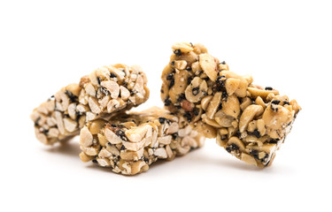 three pieces sweet peanut puffs on a white background