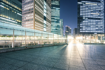 modern office buildings in downtown of tokyo at night