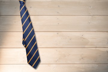 Composite image of blue tie with diagonal line