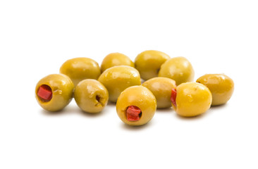 Green olives stuffed with red paprika