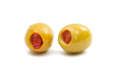 Green olives stuffed with red paprika