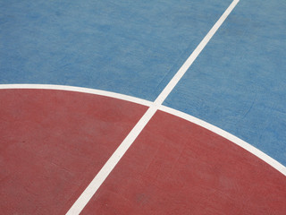 colorful basketball lines on an outdoor court