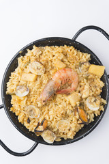 traditional spanish rice - paella isolated on white background