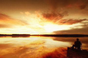 Obraz premium Fisherman at beautiful lake