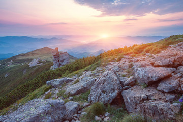Summer landscape in mountains and the dark blue sky with clouds
