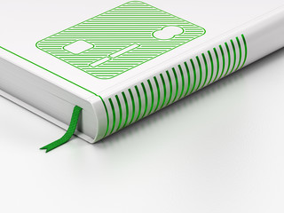 Money concept: closed book, Credit Card on white background