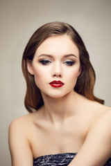 Classic red lips girl looking down