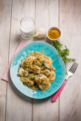 fillet fish with coconut milk and curry sauce