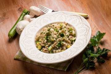 barley risotto with mushroom and zucchinis