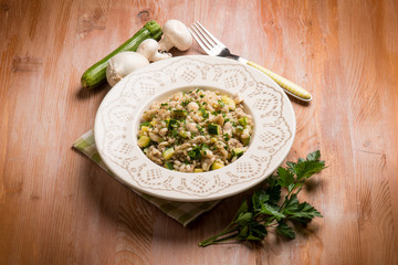 barley risotto with mushroom and zucchinis