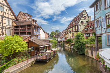 Fototapeta na wymiar Colmar, France. Vintage architectural masterpieces on the banks of the river Lauсh