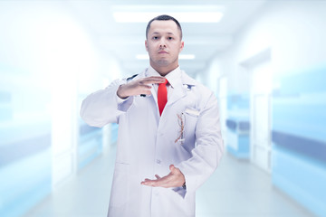 Fototapeta premium Doctor with stethoscope in a hospital. High resolution.