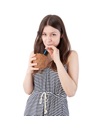 girl drinking from a coconut