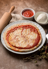 homemade pizza with buffalo mozzarella and oregano