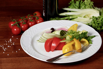 Assorted vegetables on the plate with fork