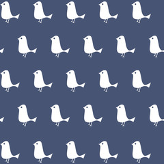 White bird seamless pattern on blue background