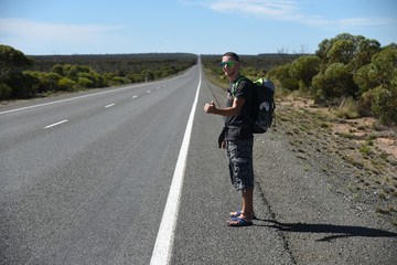 Fototapeta premium backpacker boy on road trip - Australia