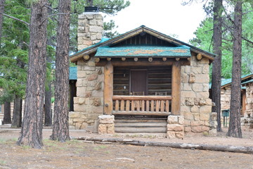 A stone log cabin in the mountains of Arizona