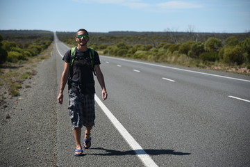 Fototapeta premium backpacker boy on road trip - Australia