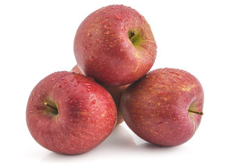Bunch of raw organic braeburn apples isolated on white background