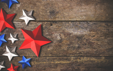 star painting of the USA flag color on wooden table, high contrast and over light, vintage ton
