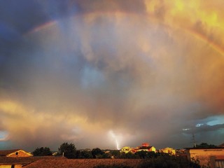 Rainbow and lightning