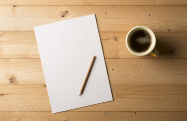 blank sheet with pencil and cup of coffee
