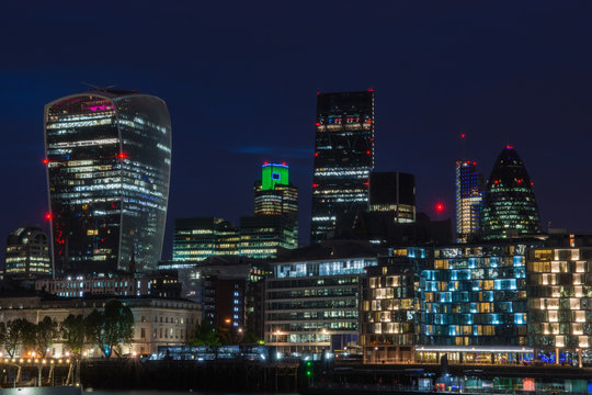Futuristic skyscrapers in city of london  at night