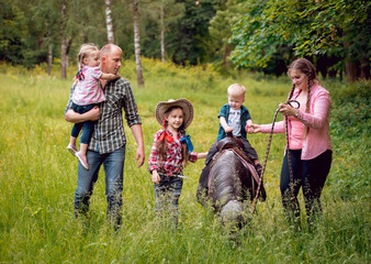 Family walks with ponies.