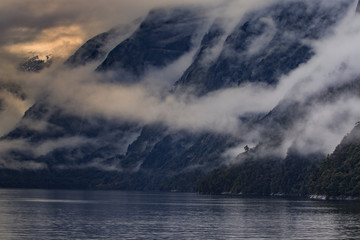 foggy mountain scene in milfordsound fiordland national park sou