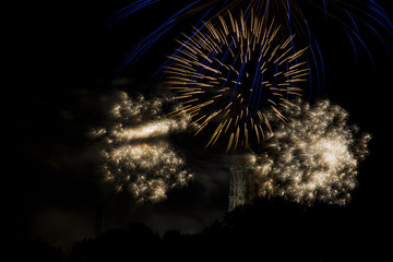 St. Rumbold's Tower surrounded by exploding fireworks