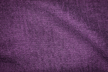 Closeup purple towel cloth and purple towel texture from towel beach for background and design with copy space for text or image.