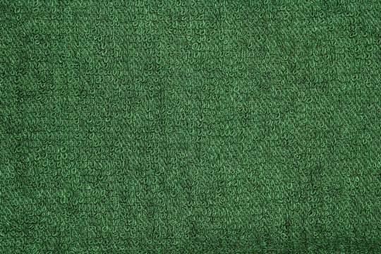 Closeup green towel cloth and green towel texture from towel beach for background and design with copy space for text or image.