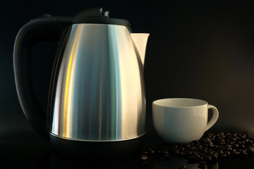 A cup of coffee and pot.