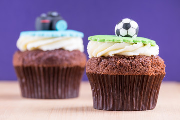 Delicious cupcakes on table