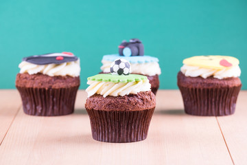 Delicious cupcakes on table