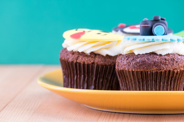 Delicious cupcakes on table