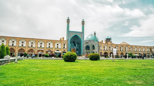 Time passing on the Imam square by the big Shah mosque, Isfahan Iran.