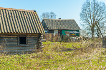 Fototapeta na wymiar Wooden house on the banks of the Volkhov river