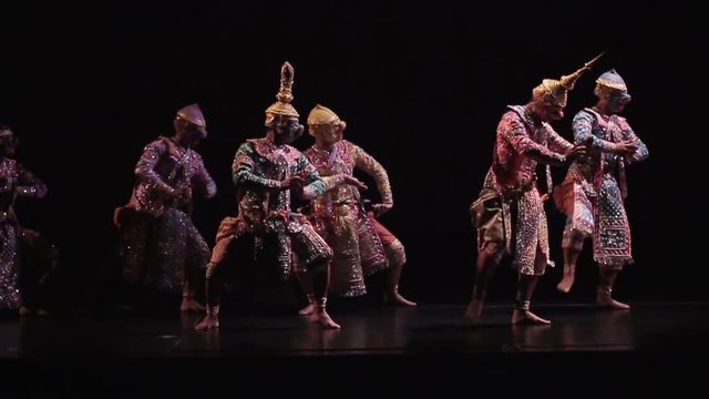 a group of people performing thai mask dance in Ramayana 2
