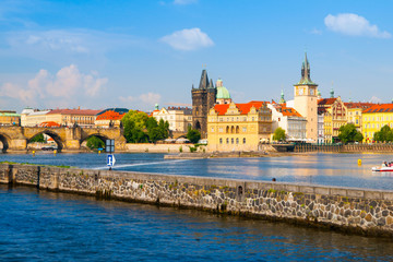 Fototapeta premium Prague Old Town towers with Charles Bridge over Vltava river, Prague, Czech Republic