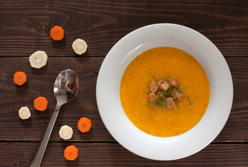 Vegetable cream soup with parsnip and carrots - obrazy, fototapety, plakaty