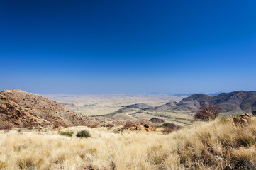 Fototapeta na wymiar Desertic landscape in the Khomas Region in Central Namibia