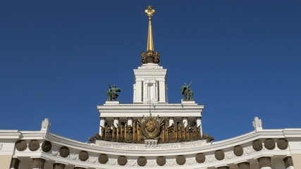 Fototapeta na wymiar main pavilion of VDNKh, Moscow in sunny day, tilt up