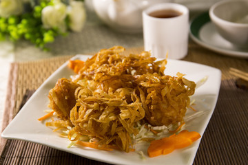 Fried chinese wanton vermicelli on white plate